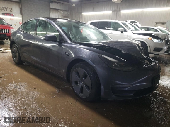 2022 Tesla Model 3 with VIN 5YJ3E1EA8NF372507, listed as a Copart auction lot 52572705 with 70,244 mi miles and Salvage Title. Bid and sale history available at DreamBid. Image 4.