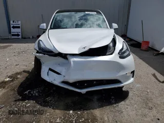 2025 Tesla Model Y Long Range with VIN 7SAYGDED4SF232433, listed as a Copart auction lot 51504015 with Not Provided miles and Salvage Title. Bid and sale history available at DreamBid. Image 5.