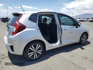 2016 Honda Fit EX with VIN JHMGK5H79GX020531, listed as a Copart auction lot 60224965 with 98,295 mi miles and Salvage title. Bid and sale history available at DreamBid. Image 3.