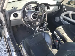 2002 MINI Hardtop with VIN WMWRC33472TC34281, listed as a Copart auction lot 71631644 with 196,947 mi miles and Salvage Title. Bid and sale history available at DreamBid. Image 8.
