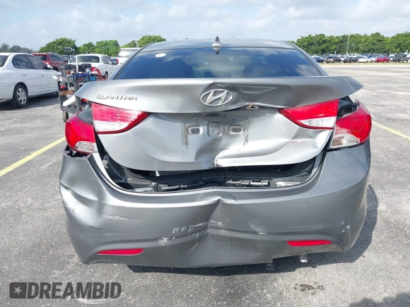 2013 Hyundai Elantra GLS z VIN 5NPDH4AE8DH253510, wystawiony jako IAAI lot #41625675 z przebiegiem 122 914 mil mil oraz . Historia ofert i sprzedaży dostępna na DreamBid. Obrazek 6.