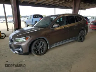 2020 BMW X1 xDrive28i with VIN WBXJG9C05L5R40935, listed as a Copart auction lot 47145335 with 46,554 mi miles and Salvage Title. Bid and sale history available at carsss.com. Image 1.