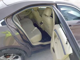 2015 Ford Taurus SEL with VIN 1FAHP2H87FG199865, listed as a IAAI auction lot 40760225 with 77,782 mi miles. Bid and sale history available at carsss.com. Image 8.