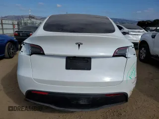 2025 Tesla Model Y Long Range with VIN 7SAYGDED6SF271931, listed as a Copart auction lot 43376015 with 261 mi miles and Salvage Title. Bid and sale history available at DreamBid. Image 6.