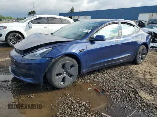 2023 Tesla Model 3 with VIN 5YJ3E1EA3PF627177, listed as a Copart auction lot 61555235 with 22,340 mi miles and Clean title. Bid and sale history available at DreamBid. Image 1.