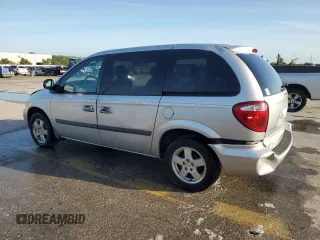 2005 Dodge Caravan SXT with VIN 1D4GP45R95B419486, listed as a Copart auction lot 60313045 with 180,615 mi miles and Salvage title. Bid and sale history available at DreamBid. Image 2.