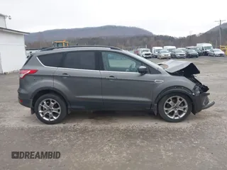 2014 Ford Escape SE with VIN 1FMCU9G9XEUB25240, listed as a IAAI auction lot 41936183 with 60,389 mi miles. Bid and sale history available at carsss.com. Image 14.