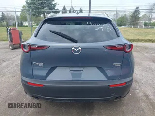 2024 Mazda CX-30 Premium z VIN 3MVDMBDY7RM613744, wystawiony jako IAAI lot #42127815 z przebiegiem 8 889 mil mil oraz . Historia ofert i sprzedaży dostępna na DreamBid. Obrazek 16.