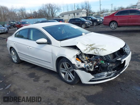 2013 Volkswagen CC Sport with VIN WVWBN7AN9DE516590, listed as a IAAI auction lot 41684586 with 153,312 mi miles. Bid and sale history available at carsss.com. Image 1.