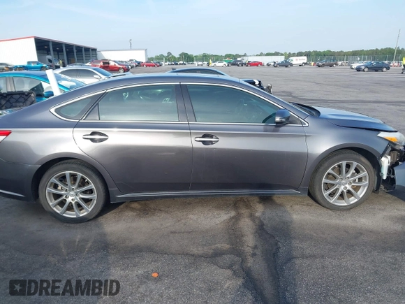 2015 Toyota Avalon Limited with VIN 4T1BK1EB4FU162164, listed as a IAAI auction lot 42041070 with 176,167 mi miles and . Bid and sale history available at DreamBid. Image 14.