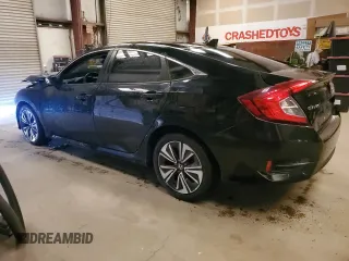 2017 Honda Civic Sedan EX-L with VIN 2HGFC1F75HH650589, listed as a Copart auction lot 77036554 with 130,080 mi miles and Clean Title. Bid and sale history available at carsss.com. Image 2.
