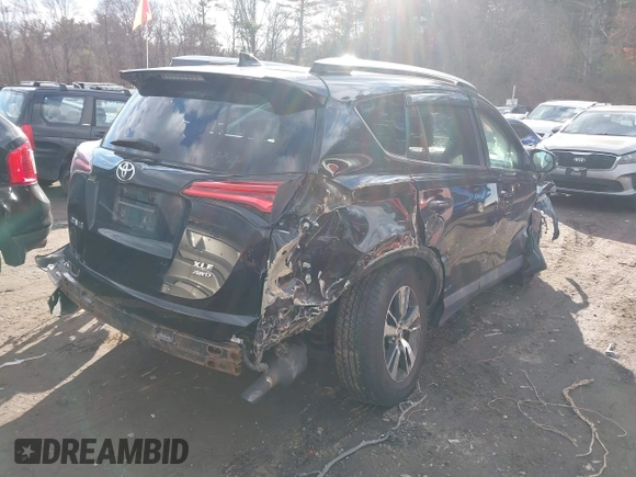 2016 Toyota RAV4 XLE with VIN 2T3RFREV4GW416606, listed as a IAAI auction lot 41387652 with 93,977 mi miles and . Bid and sale history available at DreamBid. Image 4.