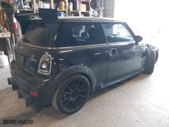 2008 MINI Cooper Hardtop S with VIN WMWMF73568TT87273, listed as a IAAI auction lot 41996859 with 107,671 mi miles. Bid and sale history available at carsss.com. Image 4.