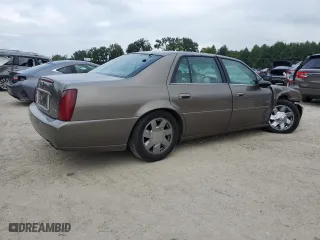 2000 Cadillac DeVille DTS with VIN 1G6KF5794YU249059, listed as a Copart auction lot 71614494 with 121,611 mi miles and Salvage Title. Bid and sale history available at carsss.com. Image 3.