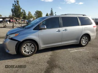 2014 Toyota Sienna XLE with VIN 5TDYK3DC8ES472826, listed as a Copart auction lot 46174385 with 129,094 mi miles and Salvage Title. Bid and sale history available at carsss.com. Image 1.