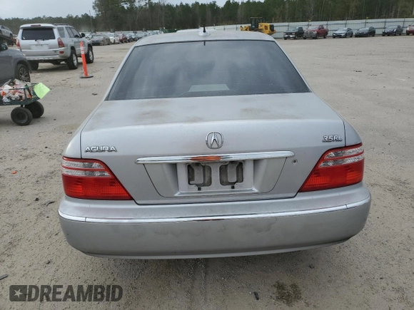 2004 Acura RL w/Navigation System z VIN JH4KA96664C003428, wystawiony jako Copart lot #87115774 z przebiegiem 164 527 mil mil oraz Szkoda całkowita • Salvage title. Historia ofert i sprzedaży dostępna na DreamBid. Obrazek 6.