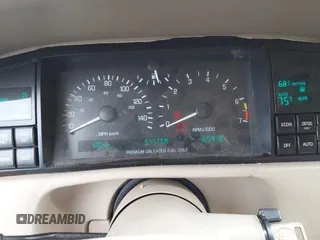 1994 Cadillac Seville STS z VIN 1G6KY5296RU823387, wystawiony jako IAAI lot #42151901 z przebiegiem 165 918 mil mil oraz . Historia ofert i sprzedaży dostępna na DreamBid. Obrazek 7.