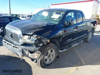2007 Toyota Tundra SR5 with VIN 5TFBV54127X011965, listed as a IAAI auction lot 41670795 with 156,864 mi miles. Bid and sale history available at carsss.com. Image 2.