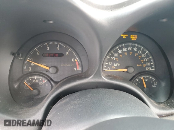 1999 Pontiac Grand Am SE2 with VIN 1G2NE52EXXM716313, listed as a Copart auction lot 86522744 with 102,438 mi miles and Salvage Title. Bid and sale history available at carsss.com. Image 9.