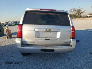 2020 Chevrolet Suburban Premier with VIN 1GNSCJKC9LR198484, listed as a Copart auction lot 87354514 with 115,008 mi miles and Salvage title. Bid and sale history available at DreamBid. Image 6.