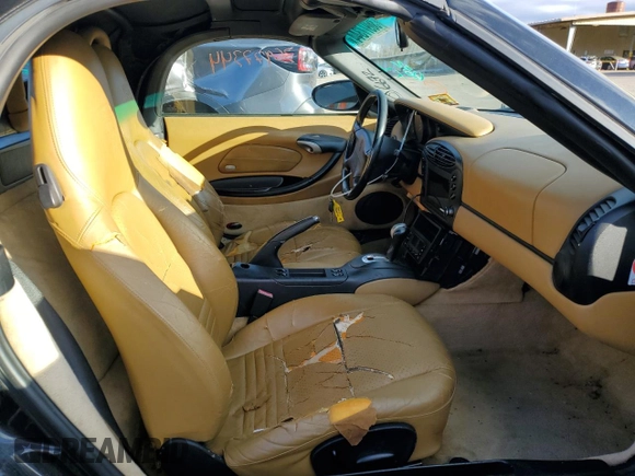 2000 Porsche Boxster z VIN WP0CA2980YU626358, wystawiony jako Copart lot #36977344 z przebiegiem 117 561 mil mil oraz Szkoda całkowita • Salvage title. Historia ofert i sprzedaży dostępna na DreamBid. Obrazek 10.