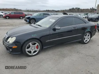 2009 Mercedes-Benz CLK 350 with VIN WDBTJ56H79F268881, listed as a Copart auction lot 79598644 with 147,088 mi miles and Salvage Title. Bid and sale history available at DreamBid. Image 1.