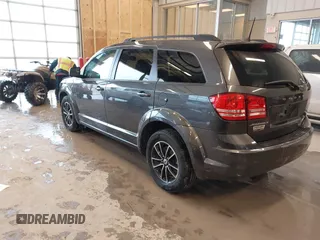 2018 Dodge Journey SE with VIN 3C4PDCAB9JT428917, listed as a IAAI auction lot 41578750 with 136,886 mi miles and . Bid and sale history available at DreamBid. Image 3.