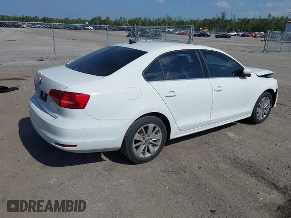 2015 Volkswagen Jetta SE с VIN 3VWD17AJXFM327152, выставлен на аукционе IAAI как лот 42055458 с пробегом 69 412 миль миль и . История ставок и продаж доступна на DreamBid. Изображение 4.