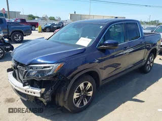 2020 Honda Ridgeline RTL with VIN 5FPYK3F56LB028917, listed as a IAAI auction lot 42280770 with 17,598 mi miles and . Bid and sale history available at DreamBid. Image 2.