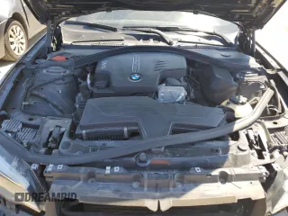 2014 BMW 2 Series 228i with VIN WBA1F5C58EV256093, listed as a Copart auction lot 57579434 with 74,596 mi miles and Salvage Title. Bid and sale history available at carsss.com. Image 11.