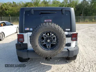2018 Jeep Wrangler Unlimited Sport with VIN 1C4BJWDG3JL807080, listed as a Copart auction lot 74887824 with 51,559 mi miles and Non Repairable. Bid and sale history available at DreamBid. Image 6.