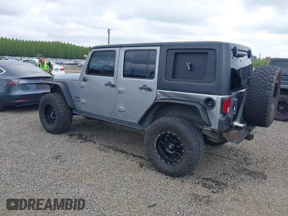 2018 Jeep Wrangler Unlimited Sport S with VIN 1C4BJWDG4JL861052, listed as a IAAI auction lot 42100517 with 43,907 mi miles and . Bid and sale history available at DreamBid. Image 3.