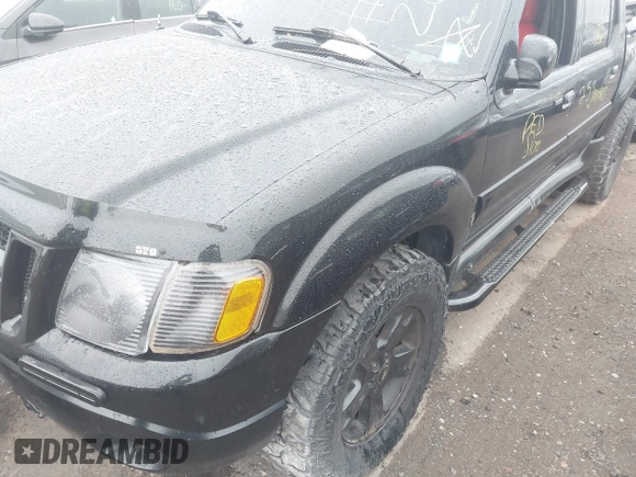 2005 Ford Explorer Sport Trac XLS z VIN 1FMZU77K35UB14856, wystawiony jako IAAI lot #42576244 z przebiegiem Nie podano mil oraz . Historia ofert i sprzedaży dostępna na DreamBid. Obrazek 6.