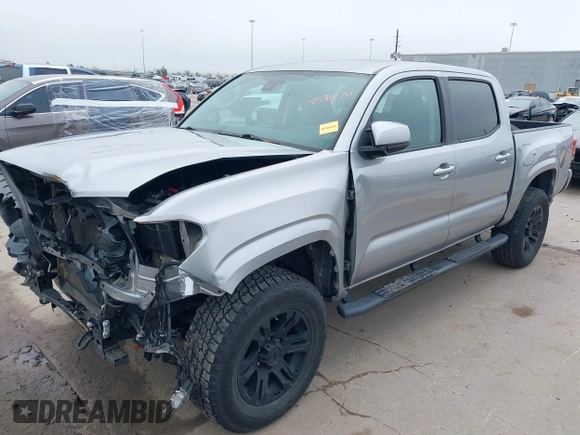 2021 Toyota Tacoma SR with VIN 3TYAX5GN0MT020061, listed as a IAAI auction lot 41592670 with 18,862 mi miles and . Bid and sale history available at DreamBid. Image 2.