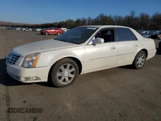 2007 Cadillac DTS V8 z VIN 1G6KD57Y27U208554, wystawiony jako Copart lot #88748645 z przebiegiem 80 341 mil mil oraz Tytuł czysty. Historia ofert i sprzedaży dostępna na DreamBid. Obrazek 1.