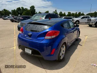 2013 Hyundai Veloster w/Black Int z VIN KMHTC6AD1DU094781, wystawiony jako Copart lot #60271115 z przebiegiem 122 541 mil mil oraz Szkoda całkowita • Salvage title. Historia ofert i sprzedaży dostępna na DreamBid. Obrazek 4.