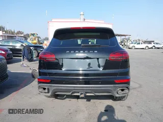 2017 Porsche Cayenne with VIN WP1AA2A29HKA86226, listed as a IAAI auction lot 40999976 with 55,883 mi miles. Bid and sale history available at carsss.com. Image 16.