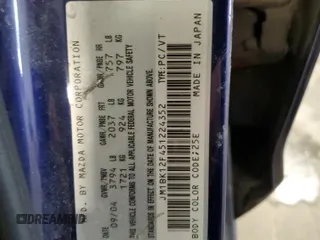 2005 Mazda 3 i with VIN JM1BK12F451224352, listed as a Copart auction lot 44708585 with 156,698 mi miles and Salvage Title. Bid and sale history available at DreamBid. Image 12.
