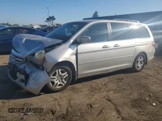 2007 Honda Odyssey EX with VIN 5FNRL38447B453489, listed as a Copart auction lot 62841325 with 215,114 mi miles and Clean title. Bid and sale history available at DreamBid. Image 1.