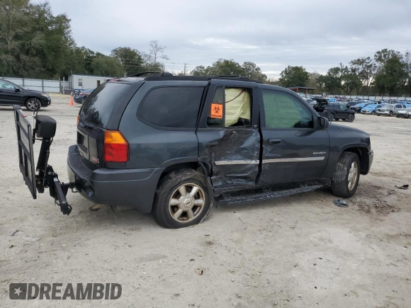 2006 GMC Envoy SLE with VIN 1GKDS13S562135135, listed as a Copart auction lot 88353995 with 159,251 mi miles and Salvage Title. Bid and sale history available at carsss.com. Image 3.