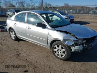 2009 Mazda 3 i Touring Value with VIN JM1BK32G691229093, listed as a IAAI auction lot 41645687 with 196,723 mi miles. Bid and sale history available at carsss.com. Image 1.