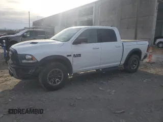 2016 Ram 1500 Rebel z VIN 1C6RR7YT3GS385998, wystawiony jako Copart lot #88633265 z przebiegiem 133 802 mil mil oraz Szkody całkowita. Historia ofert i sprzedaży dostępna na DreamBid. Obrazek 1.