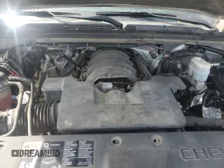 2015 Chevrolet Tahoe z VIN 1GNSK3EC3FR305401, wystawiony jako Copart lot #80819994 z przebiegiem Nie podano mil oraz Szkoda całkowita • Salvage title. Historia ofert i sprzedaży dostępna na DreamBid. Obrazek 12.