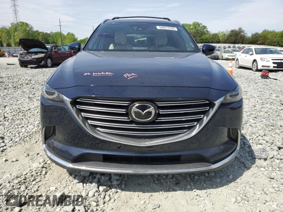 2016 Mazda CX-9 Grand Touring with VIN JM3TCBDY0G0116686, listed as a Copart auction lot 54077335 with 142,670 mi miles and Salvage title. Bid and sale history available at DreamBid. Image 5.