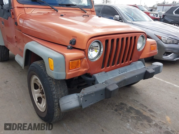 2000 Jeep Wrangler SE with VIN 1J4FA29P2YP804574, listed as a IAAI auction lot 41723297 with 172,991 mi miles. Bid and sale history available at carsss.com. Image 6.