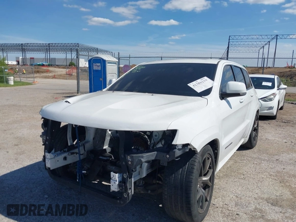 2020 Jeep Grand Cherokee Trackhawk with VIN 1C4RJFN96LC141513, listed as a IAAI auction lot 42386219 with Not provided miles and . Bid and sale history available at DreamBid. Image 6.
