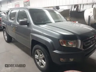 2011 Honda Ridgeline RTL with VIN 5FPYK1F57BB004189, listed as a IAAI auction lot 41871741 with 193,913 mi miles. Bid and sale history available at carsss.com. Image 1.