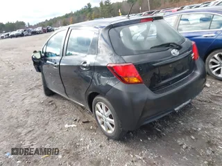 2015 Toyota Yaris L with VIN VNKKTUD39FA028708, listed as a IAAI auction lot 40978326 with 83,377 mi miles. Bid and sale history available at carsss.com. Image 3.