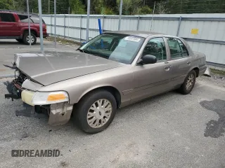 2005 Ford Crown Victoria LX z VIN 2FAFP74W95X126417, wystawiony jako Copart lot #73537004 z przebiegiem 246 163 mil mil oraz Szkoda całkowita • Salvage title. Historia ofert i sprzedaży dostępna na DreamBid. Obrazek 1.