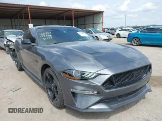 2021 Ford Mustang GT with VIN 1FA6P8CF5M5111095, listed as a IAAI auction lot 41884815 with 39,259 mi miles and . Bid and sale history available at DreamBid. Image 1.